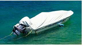 Covered Boat Moored For Storage